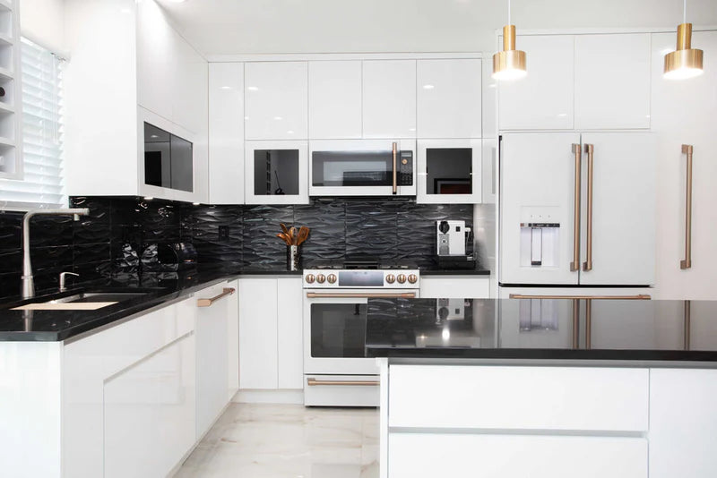 Traditional kitchen with classic raised panel cabinets and decorative hardware - Captivating Cabinets
